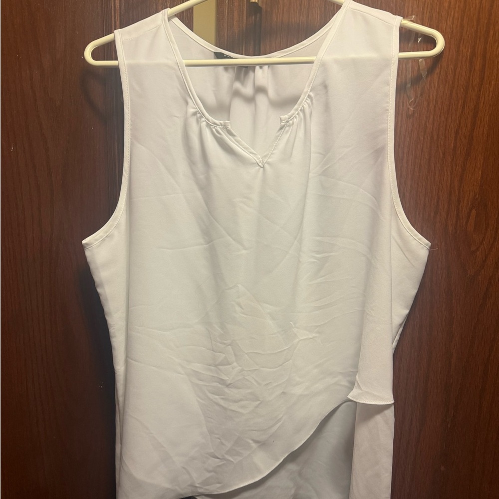 White sleeveless blouse XL